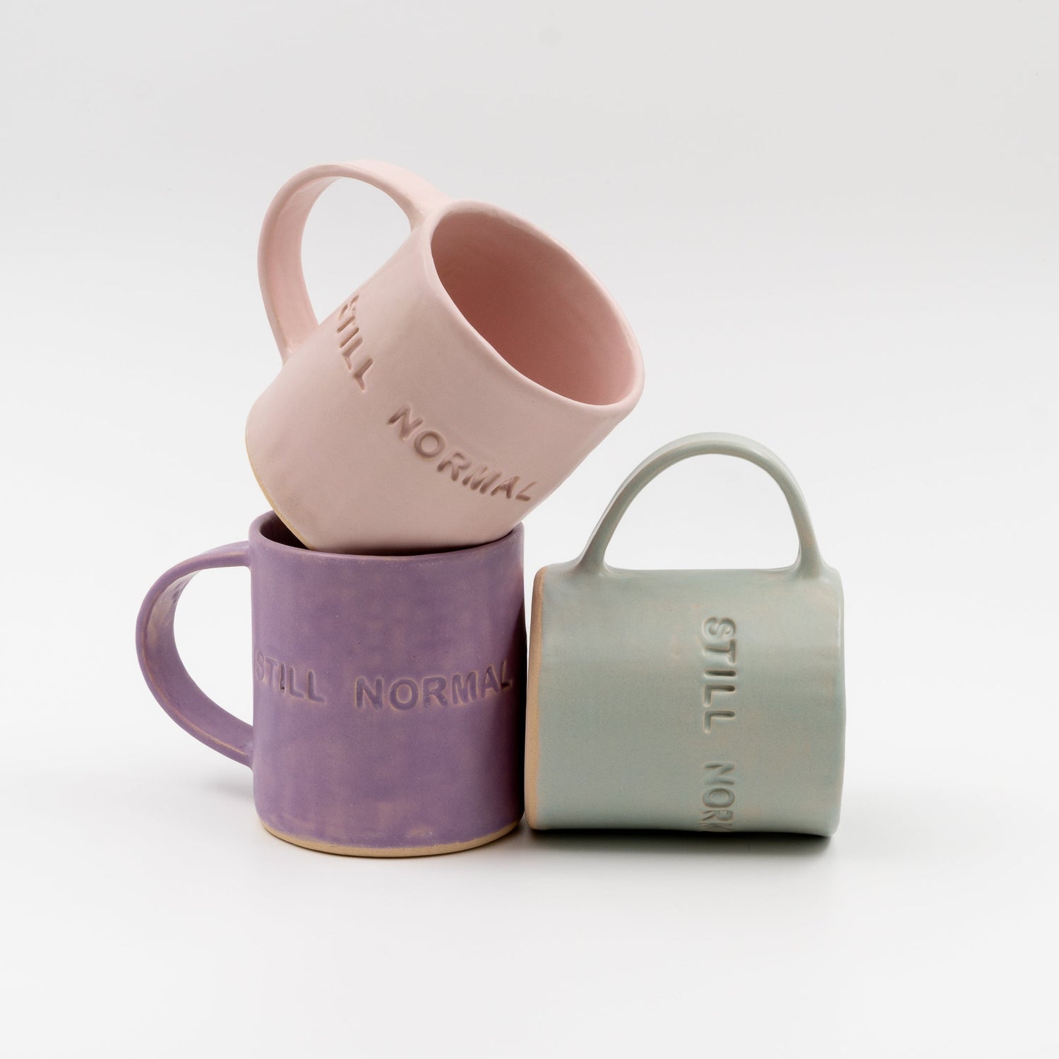 "Still normal size" pastel watercolor mugs