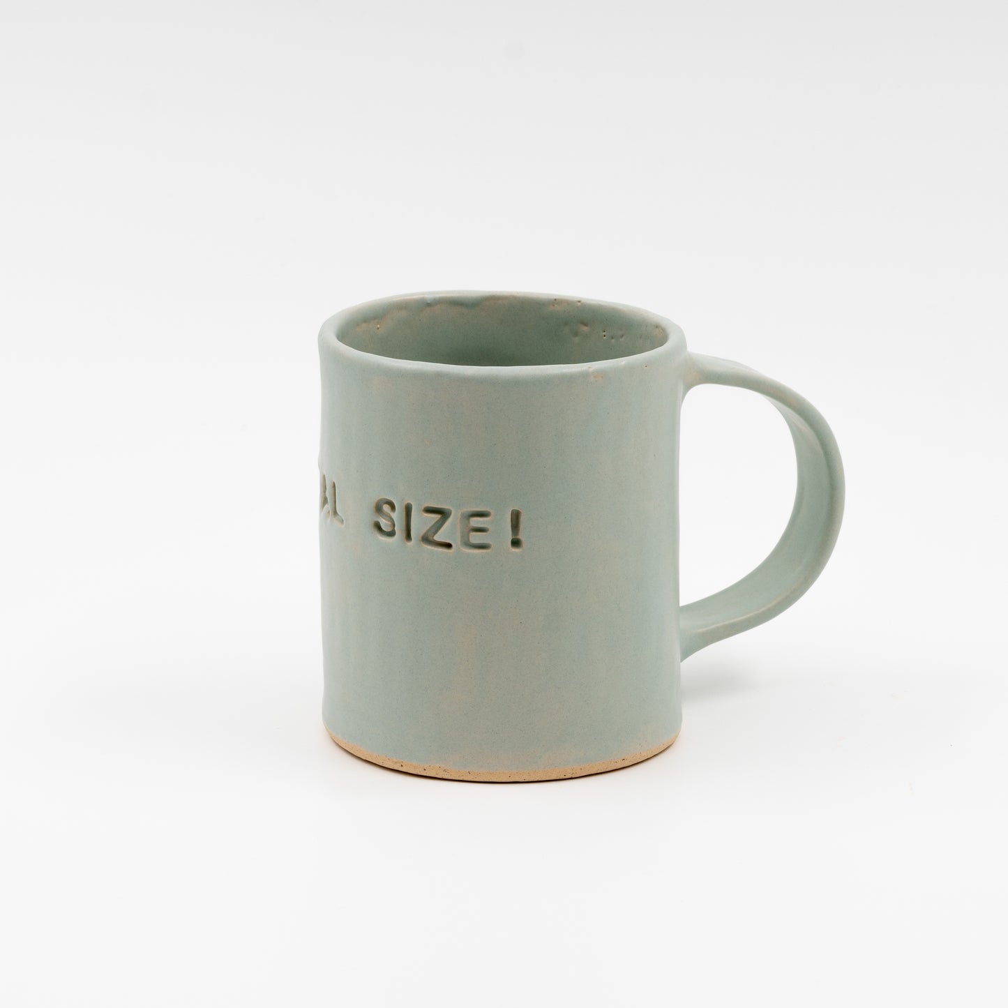 "Still normal size" pastel green mug