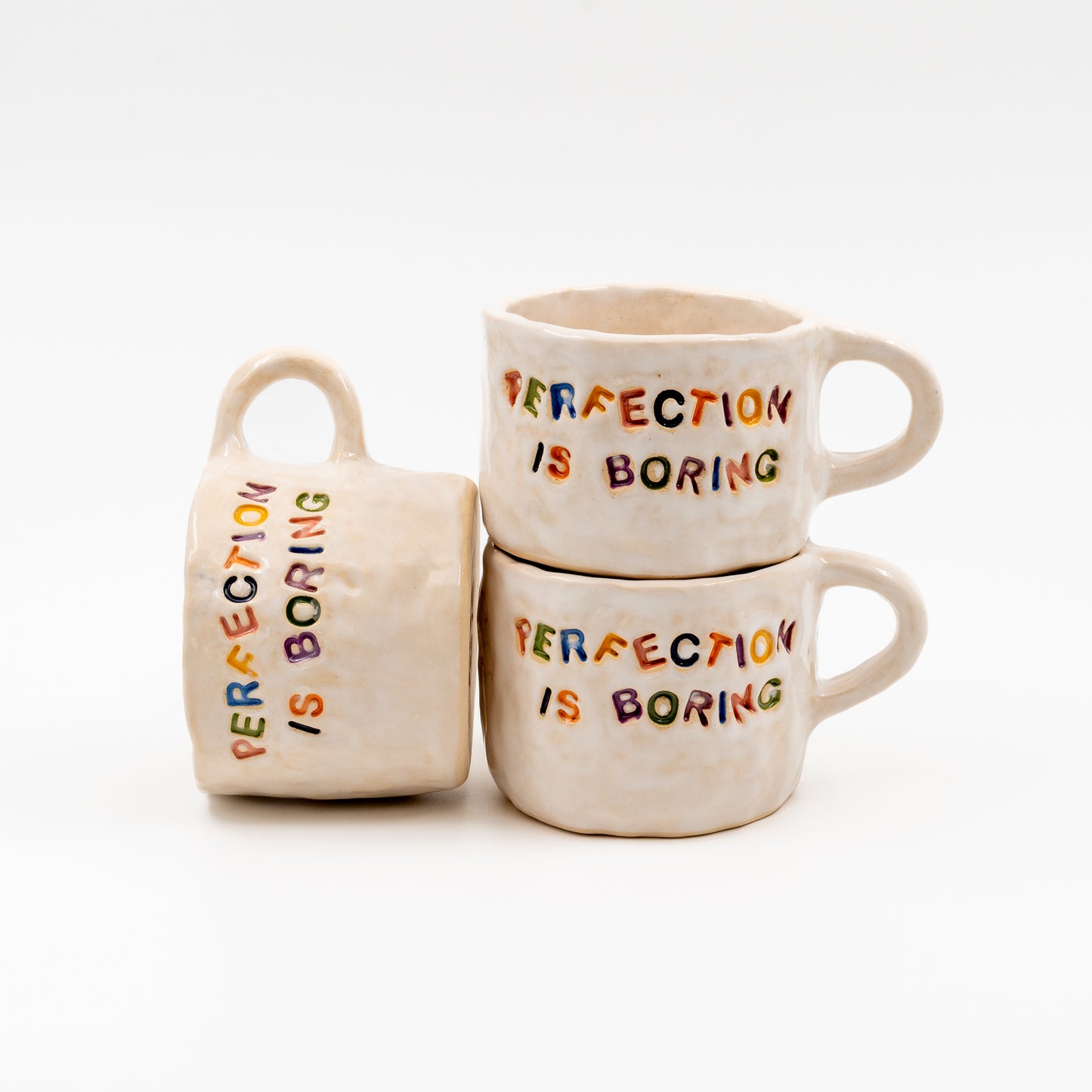 "Perfection is boring" mug