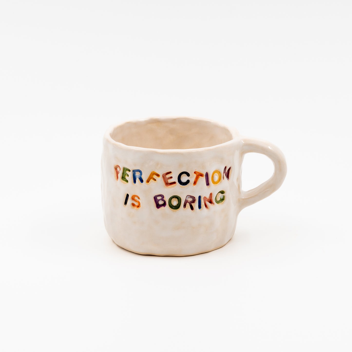 "Perfection is boring" mug