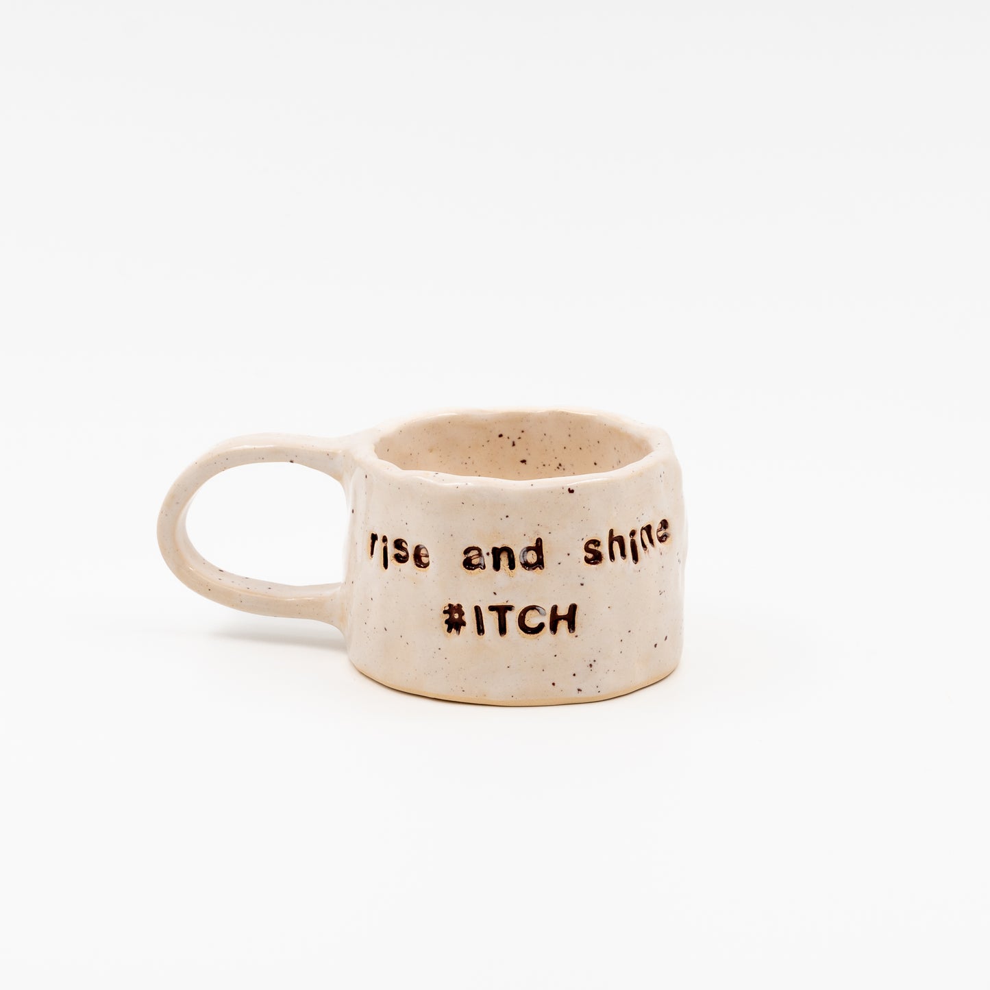 "Rise and shine #ITCH" mug